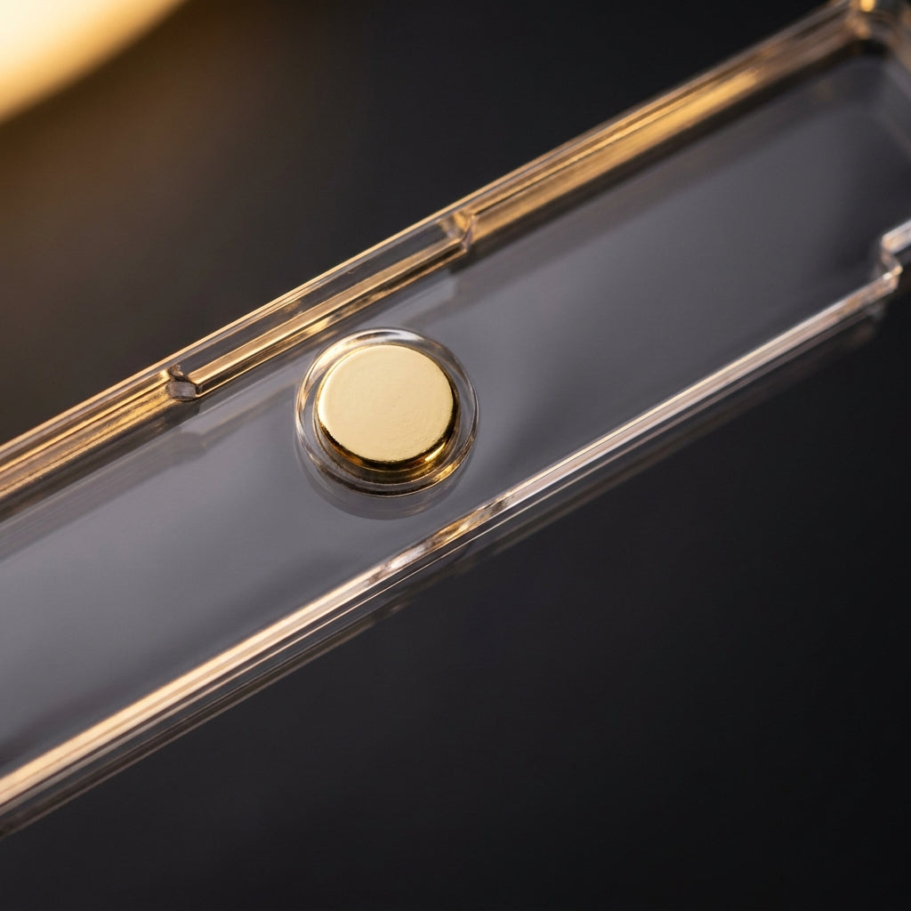 Macro of the gold magnet disc seated in the acrylic 35PT card holder