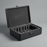Fire-resistant graded card storage box open and empty showing its foam card slots
