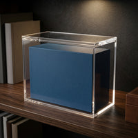 Magnetic Acrylic Display Case — glowing on a dark wood shelf